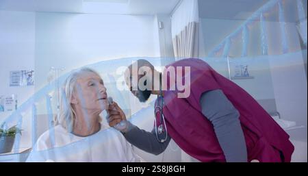 Image of dna strand rotating over diverse male doctor checking ear of senior female patient Stock Photo