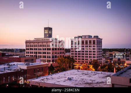 Springfield, MO USA - October 10, 2020: Citiscape of Downtown Springfield, Missouri, includes a lit-up History Museum. Stock Photo