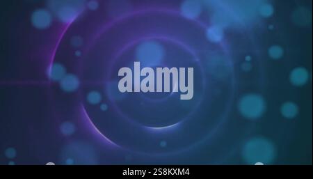 Image of blue spots and circles moving on black background Stock Photo