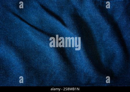 Deep Blue Denim with a Wrinkled Texture Stock Photo