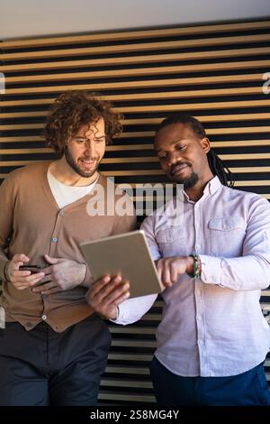 Multiethnic professional business people, programmer working in office with computer Stock Photo
