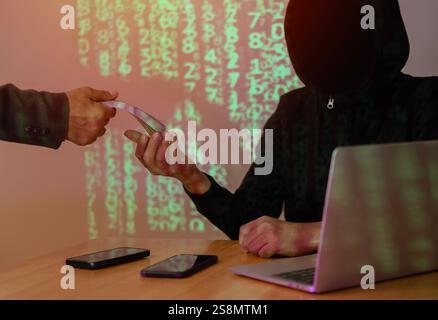 Shot of person is giving money to computer hacker to decrypt files, computer ransomware concept. Selective focus. Stock Photo