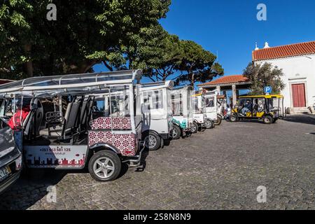 Tuk Tuk's parked at St George's Castle. Lisbon, Portugal. Stock Photo