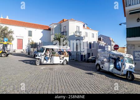 Tuk Tuk's arriving at St George's Castle. Lisbon, Portugal. Stock Photo