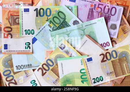Euro currency banknotes background. European paper money backdrop with 50, 100, 200 and 500 euros bills. Stock Photo