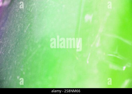 Green and purple abstract background creating a soft and dreamy atmosphere Stock Photo