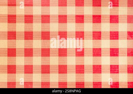 Red and yellow chequered fabric in a close up view Stock Photo