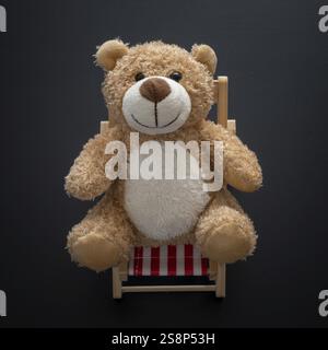 An image of a teddy bear isolated on black background Stock Photo