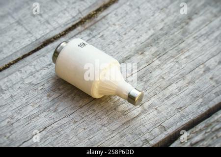 An image of an old ceramic fuse Stock Photo