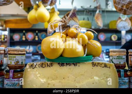 Market, food sale and cheese counter, round cheese bubble, Cagliari, Europe, metropolitan city of Cagliari, Italy Stock Photo