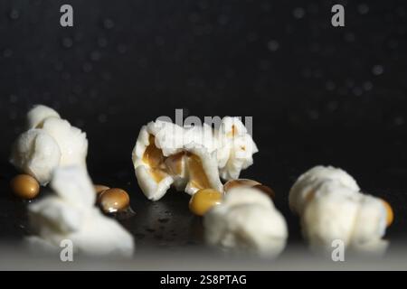 An image of popcorn in a pan detail close up Stock Photo