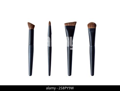 A set of black makeup brushes isolated cutout on white Stock Photo
