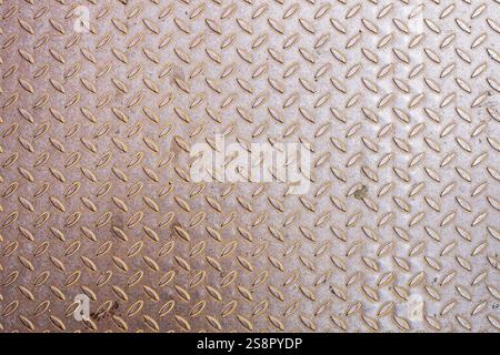 An image of a rusty diamond metal plate background Stock Photo