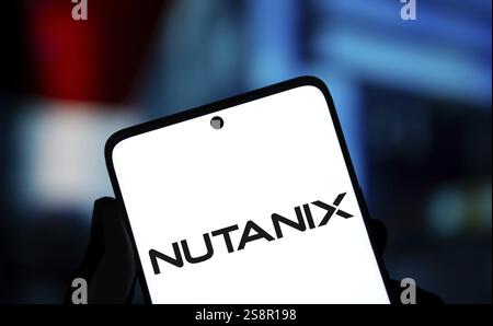 Nutanix logo is displayed on smartphone. Nutanix Inc is an American cloud computing company Stock Photo