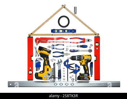 Concept shot: tools arranged in the shape of a house, studio isolated. Represents home improvement, construction, service or repair. Stock Photo