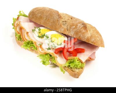 Rye Baguette with Ham and Eggs on white Background Stock Photo