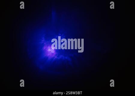 A series of vibrant abstract images inspired by cosmic phenomena, featuring multicolored bursts of light and ethereal glows. Stock Photo