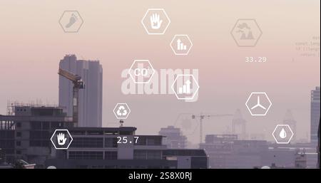 Image of network of eco icons over cityscape Stock Photo