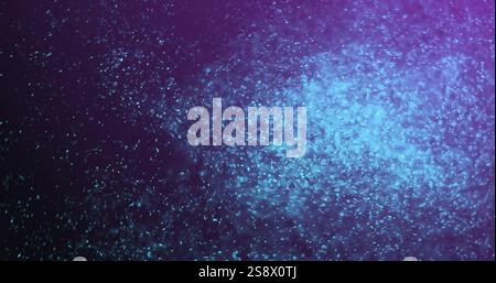Image of glowing spots of light moving over dark background Stock Photo