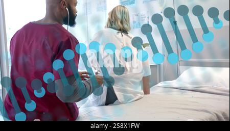 Image of dna over diverse male doctor using stethoscope on back of senior female patient Stock Photo