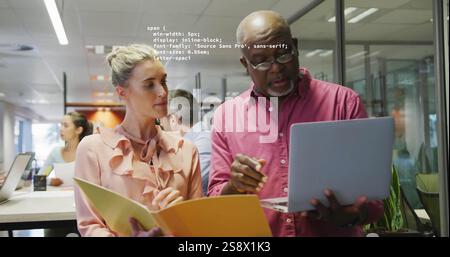 Image of data processing over diverse colleagues working in creative office Stock Photo