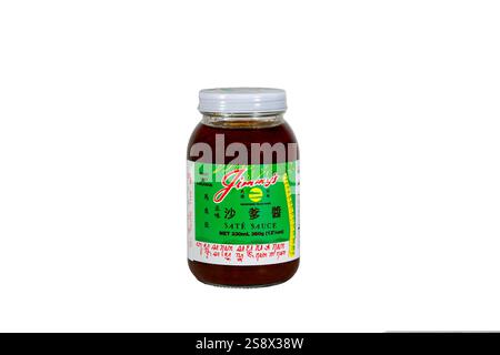 A jar of Jimmy's Sate Sauce, made in Hong Kong, isolated on a white background. Cutout for editorial and illustration use. Stock Photo