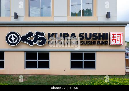 Signage for Kura Revolving Sushi Bar ������˾, the US subsidary of Kura Sushi, a conveyor belt sushi chain restaurant. Stock Photo