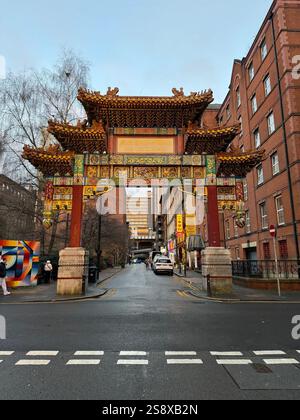 The ornate Chinese Imperial archway at the entrance to Chinatown in Manchester, one of the largest Chinatowns in Europe. Stock Photo