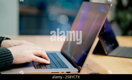 typing on laptop keyboard office workplace city blurred background business style Stock Photo
