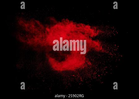 Abstract red powder dust explosion on black background. Stock Photo