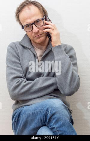Man Engaged in a Phone Call Stock Photo