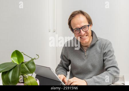 Smiling Entrepreneur Engaged in Work Stock Photo