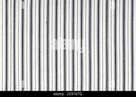 Close-up of striped fabric with black and white threads Stock Photo