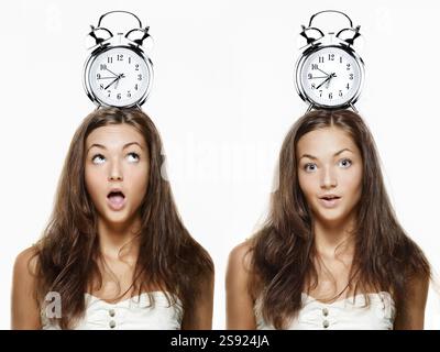 Photo series of a young woman who is late in the morning and wears a retro alarm clock on her head Stock Photo