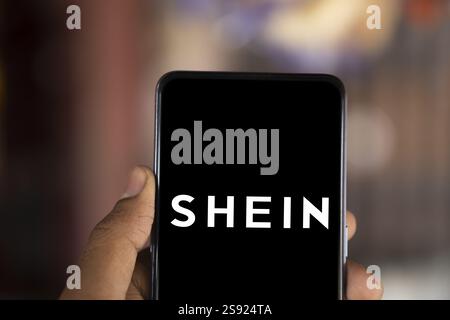 Dhaka, bangladesh- 26 Nov 2024: Shein logo is displayed on smartphone.Shein is a fast fashion retailer company Stock Photo