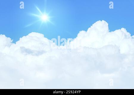 An image of a typical blue sky with sun and clouds background Stock Photo