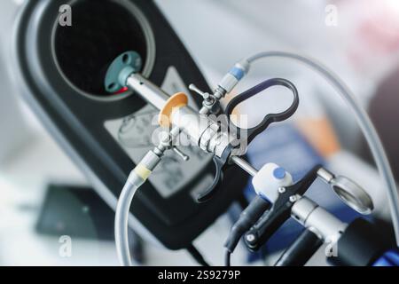 Close-up view of a sophisticated laparoscopic device with various attachments Stock Photo