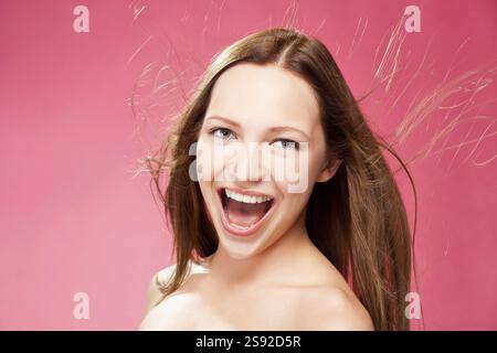Attractive young woman close-up studio portrait Stock Photo