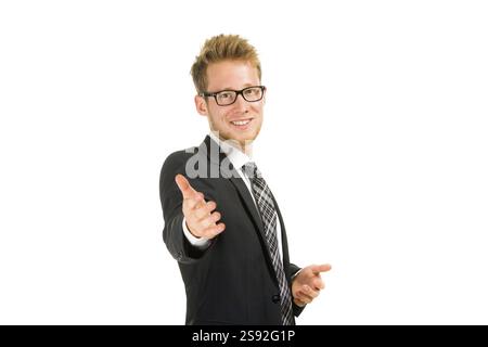 Portrait of a young, handsome man. Elegant businessman in a suit against a white background Stock Photo