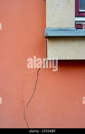 Crack in a wall construction defects vertical Stock Photo