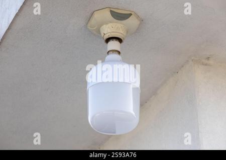 A white LED light bulb is mounted on the roof. Stock Photo