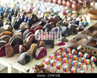Goreme, Cappadocia, Turkey - November 23, 2024: Various colorful polished natural crystal stones displayed in a souvenir shop Stock Photo
