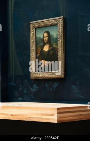 Mona Lisa framed art at the Louvre Museum, Paris, France Stock Photo
