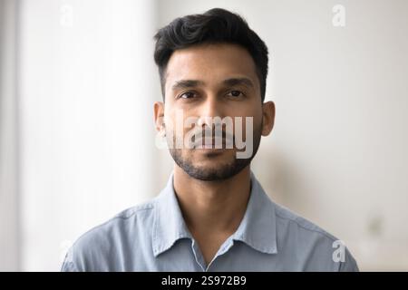 Head shot portrait profile picture handsome bearded casual millennial man Stock Photo