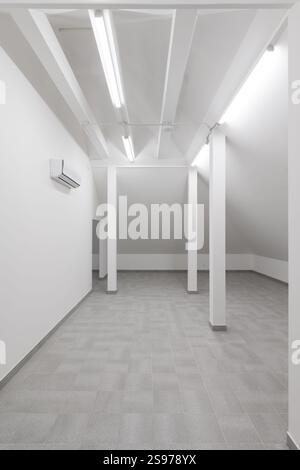 Empty Modern Room with Columns and Tiled Floor Stock Photo