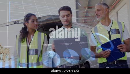 Image of data processing and diagrams over diverse colleagues using tablet at warehouse Stock Photo