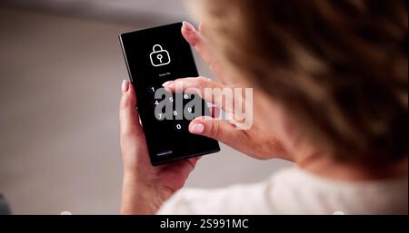 Mobile Phone Security Lock. Woman Using Virtual Stock Photo