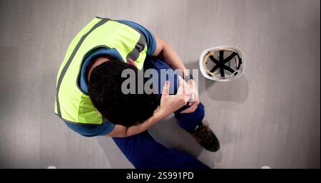 Factory Safety And Health Accident: Employee Emergency and First Aid Stock Photo