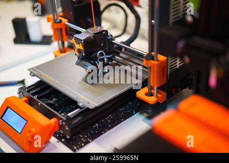 3d printer prototype object machine display orange elements creating model process isometric view Stock Photo