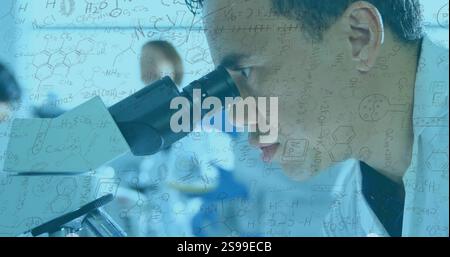 Scientist using microscope with chemical formulas image over laboratory background Stock Photo